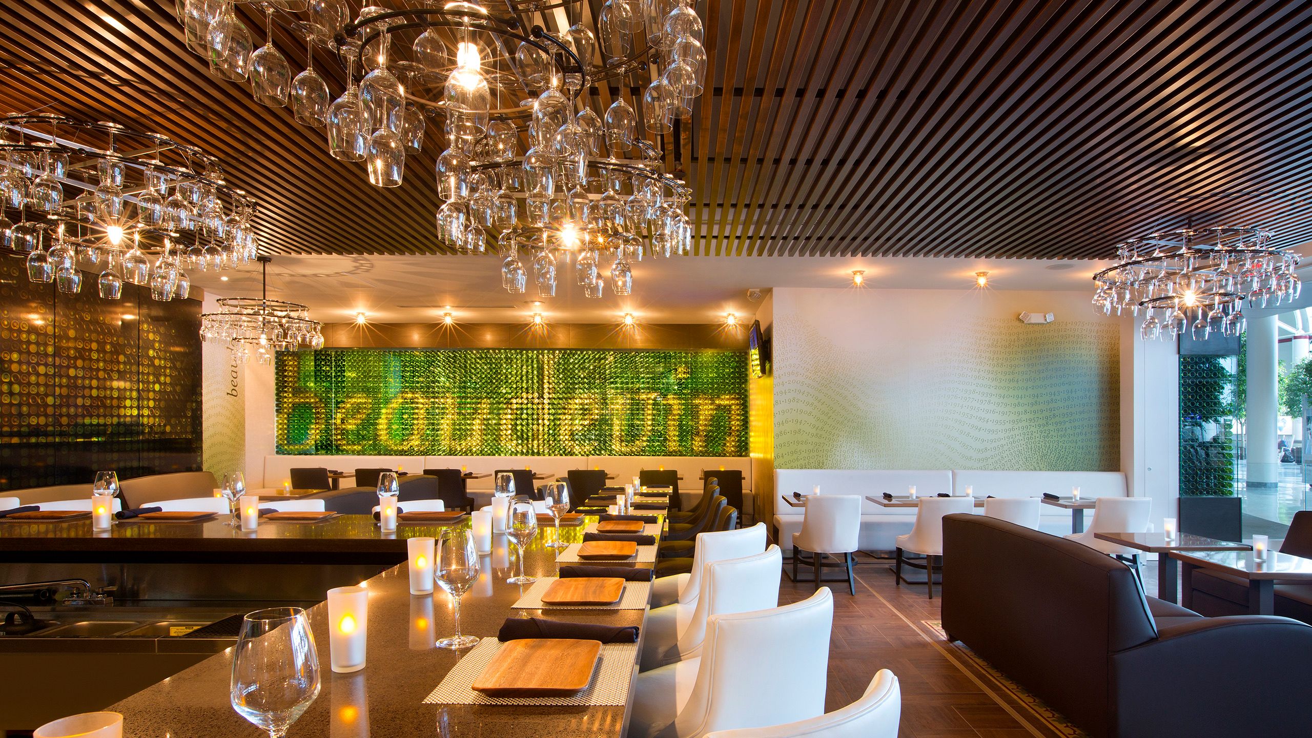 Wine glass chandeliers in a restaurant setting
