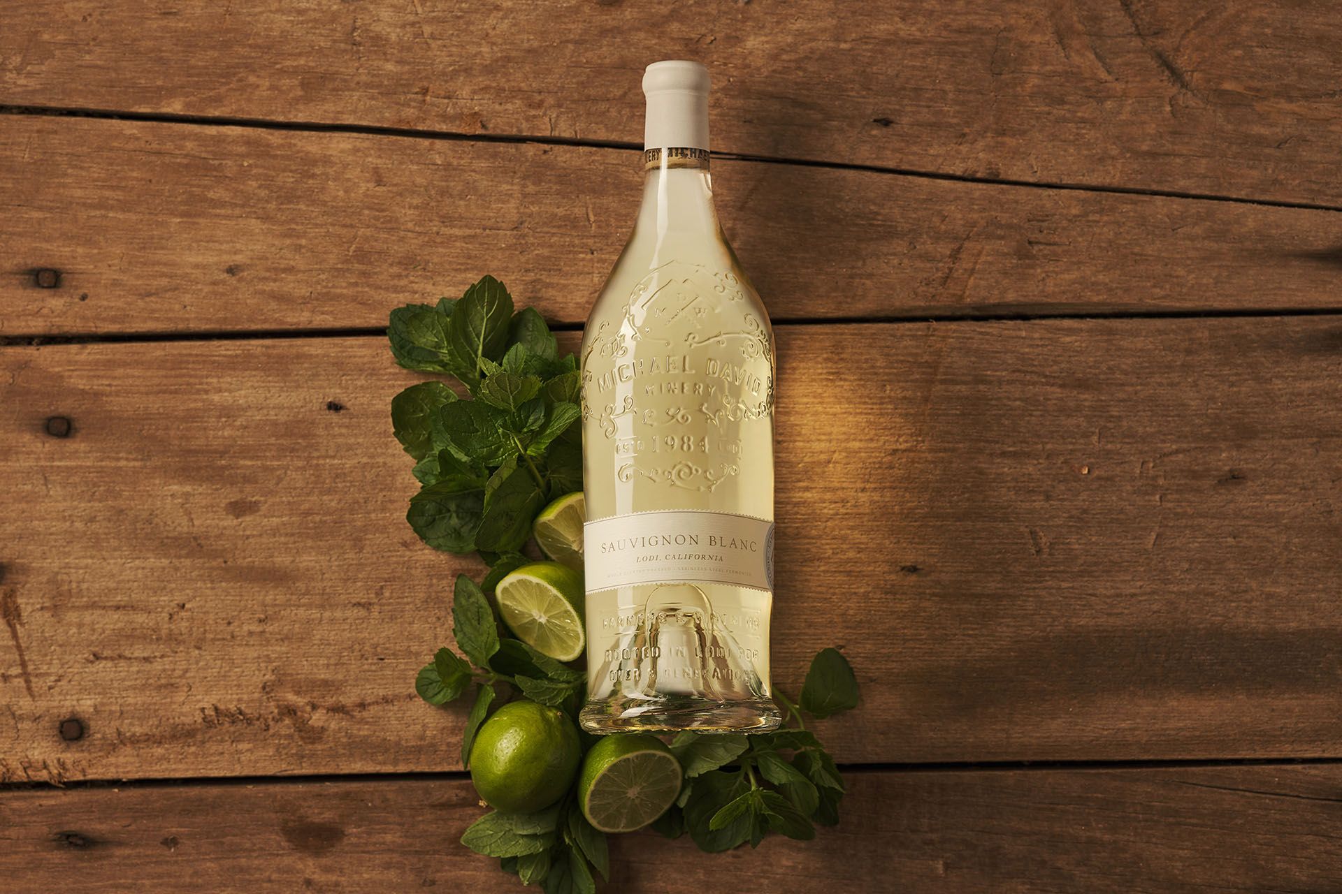 Bright vineyard scene with Sauvignon Blanc grapes catching morning light